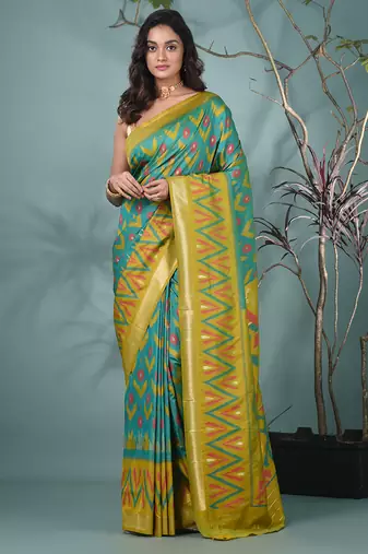 exquisite turquoise blue pochampally silk blend saree with vibrant ikat pattern