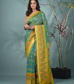 exquisite turquoise blue pochampally silk blend saree with vibrant ikat pattern