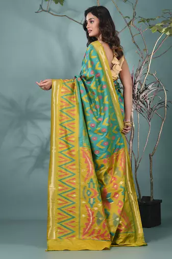 exquisite turquoise blue pochampally silk blend saree with vibrant ikat pattern