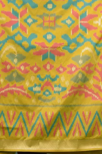 exquisite turquoise blue pochampally silk blend saree with vibrant ikat pattern