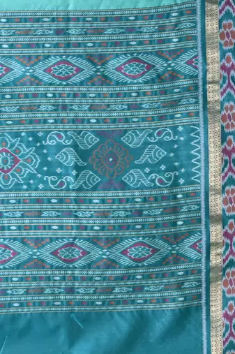 elegant sea green tussar silk blend saree with sambhal puri ikat border