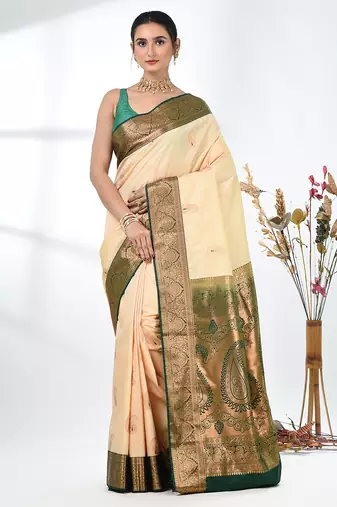 glamorous beige south silk blend saree with intricate zari border