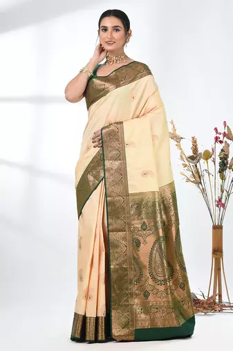 glamorous beige south silk blend saree with intricate zari border