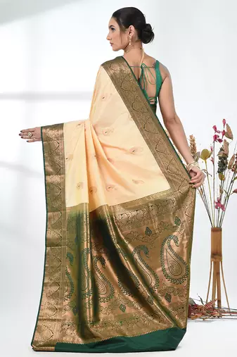 glamorous beige south silk blend saree with intricate zari border