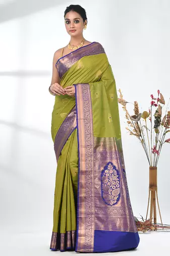 glamorous lime green south silk blend saree with intricate zari border