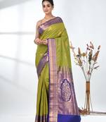 glamorous lime green south silk blend saree with intricate zari border