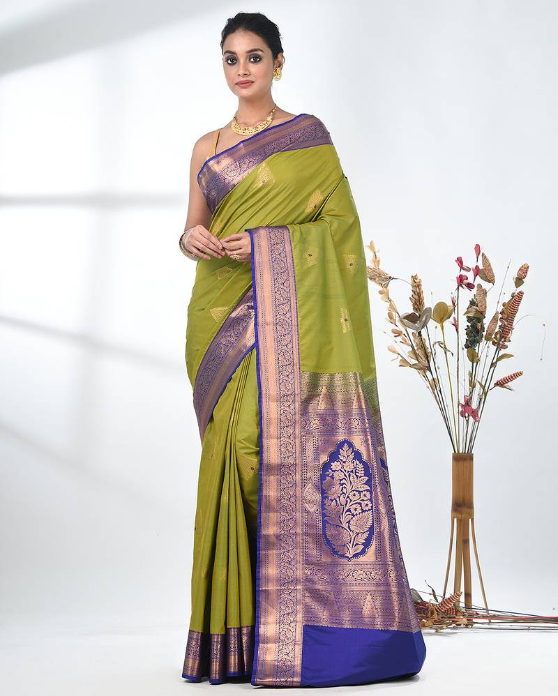glamorous lime green south silk blend saree with intricate zari border