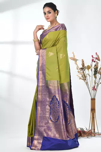 glamorous lime green south silk blend saree with intricate zari border