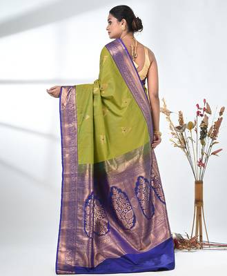 glamorous lime green south silk blend saree with intricate zari border 3