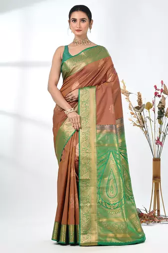 glamorous brown south silk blend saree with intricate zari border