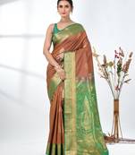 glamorous brown south silk blend saree with intricate zari border