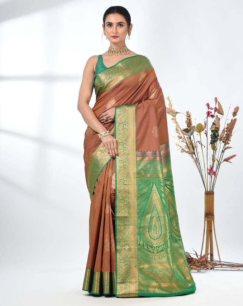 glamorous brown south silk blend saree with intricate zari border