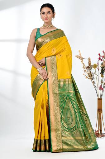 glamorous mustard south silk blend saree with intricate zari border