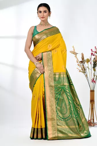 glamorous mustard south silk blend saree with intricate zari border