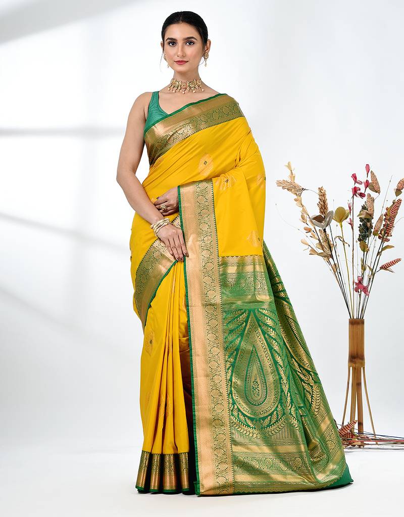 glamorous mustard south silk blend saree with intricate zari border