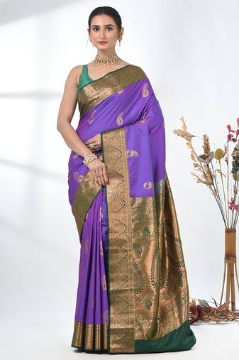 glamorous violet south silk blend saree with intricate zari border