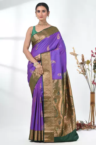 glamorous violet south silk blend saree with intricate zari border