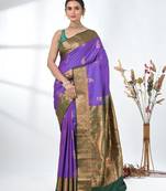 glamorous violet south silk blend saree with intricate zari border