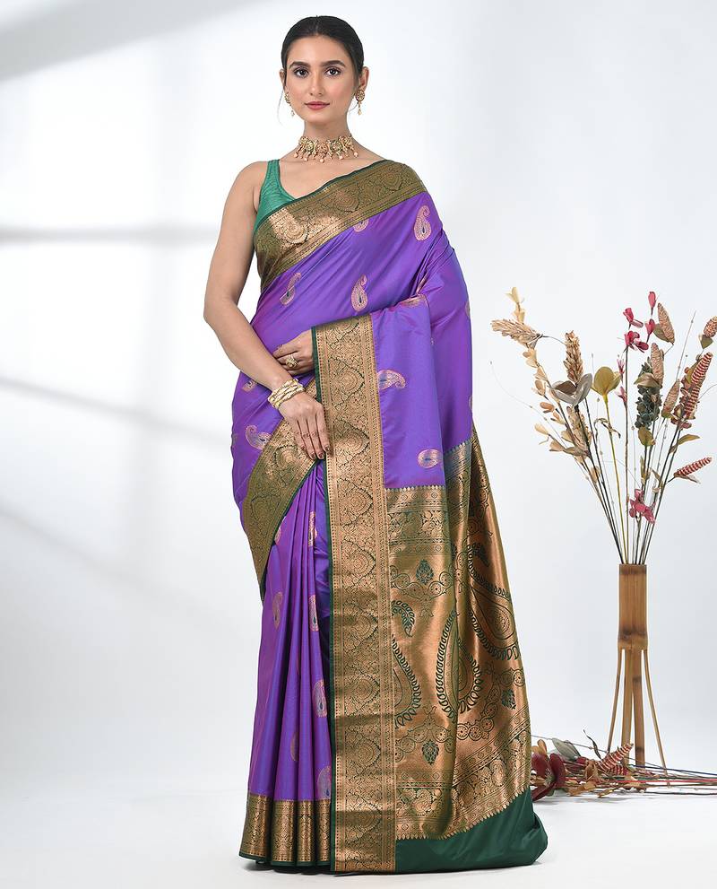 glamorous violet south silk blend saree with intricate zari border