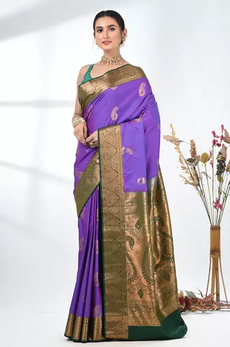 glamorous violet south silk blend saree with intricate zari border