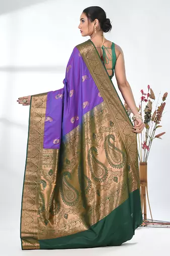 glamorous violet south silk blend saree with intricate zari border
