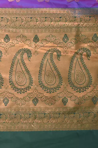 glamorous violet south silk blend saree with intricate zari border