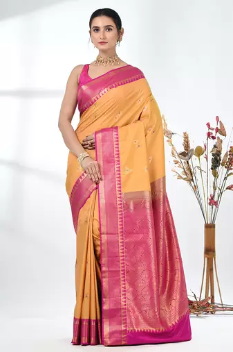 glamorous mustard south silk blend saree with intricate zari border