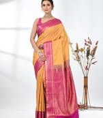 glamorous mustard south silk blend saree with intricate zari border