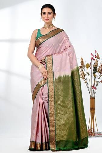 elegant pale pink south silk blend saree with green zari border