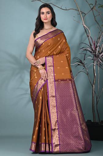 elegant ochre yellow south silk blend saree with green zari border