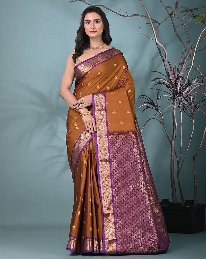 elegant ochre yellow south silk blend saree with green zari border