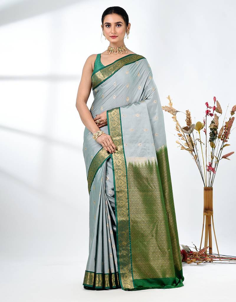 elegant mint green south silk blend saree with green zari border