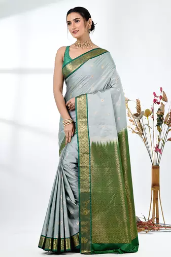 elegant mint green south silk blend saree with green zari border