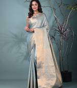 exquisite sky blue tissue brocade saree with intricate zari work