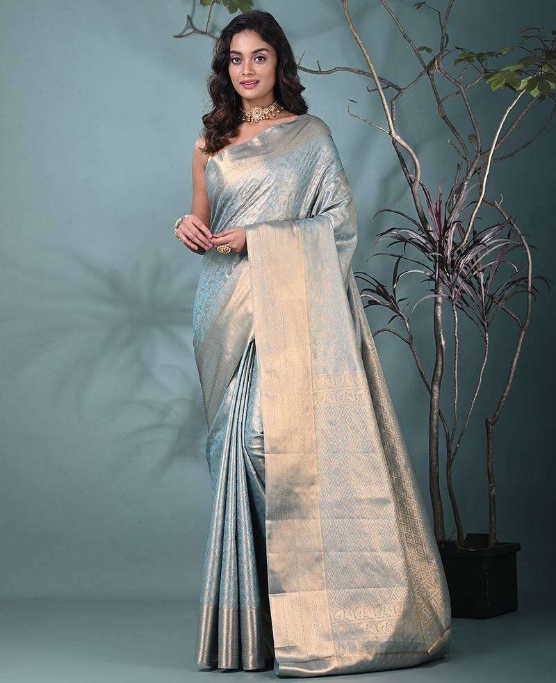 exquisite sky blue tissue brocade saree with intricate zari work