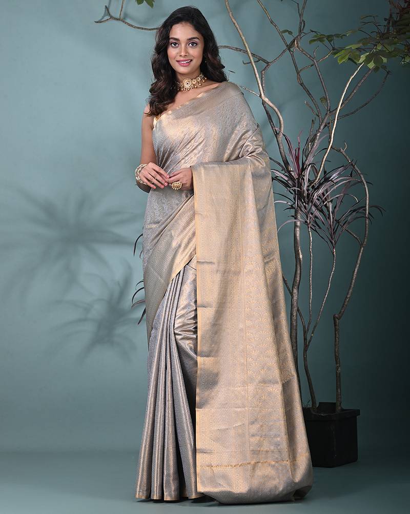 exquisite grey tissue brocade saree with intricate zari work