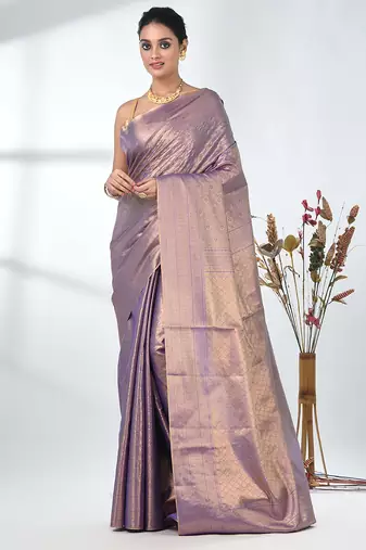 exquisite violet tissue brocade saree with intricate zari work