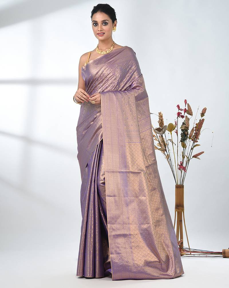 exquisite violet tissue brocade saree with intricate zari work