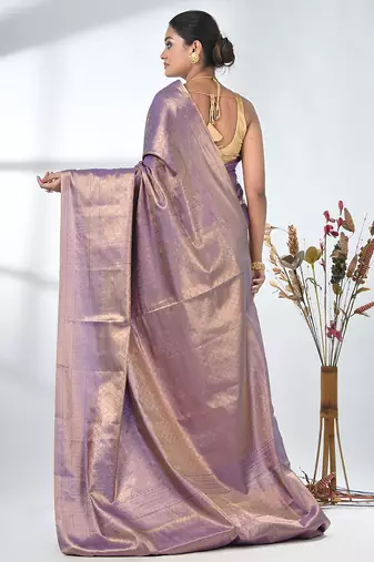 exquisite violet tissue brocade saree with intricate zari work