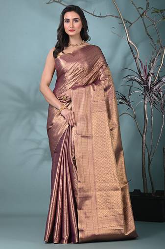 exquisite purple tissue brocade saree with intricate zari work