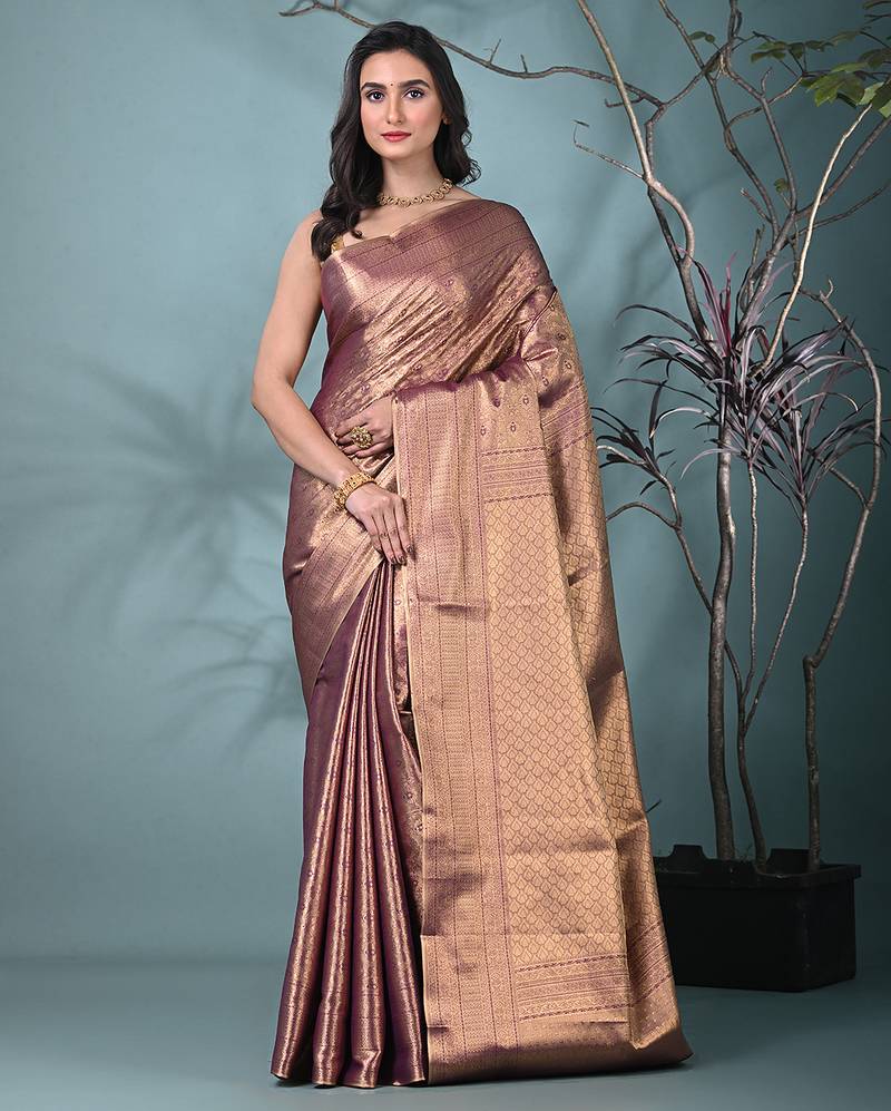 exquisite purple tissue brocade saree with intricate zari work
