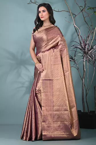 exquisite purple tissue brocade saree with intricate zari work