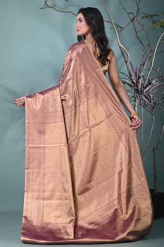 exquisite purple tissue brocade saree with intricate zari work