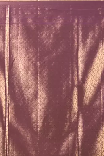 exquisite purple tissue brocade saree with intricate zari work