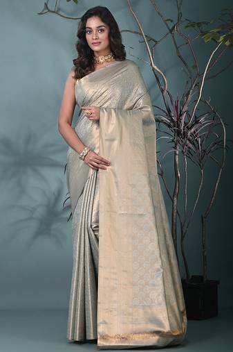 exquisite sea green tissue brocade saree with intricate zari work