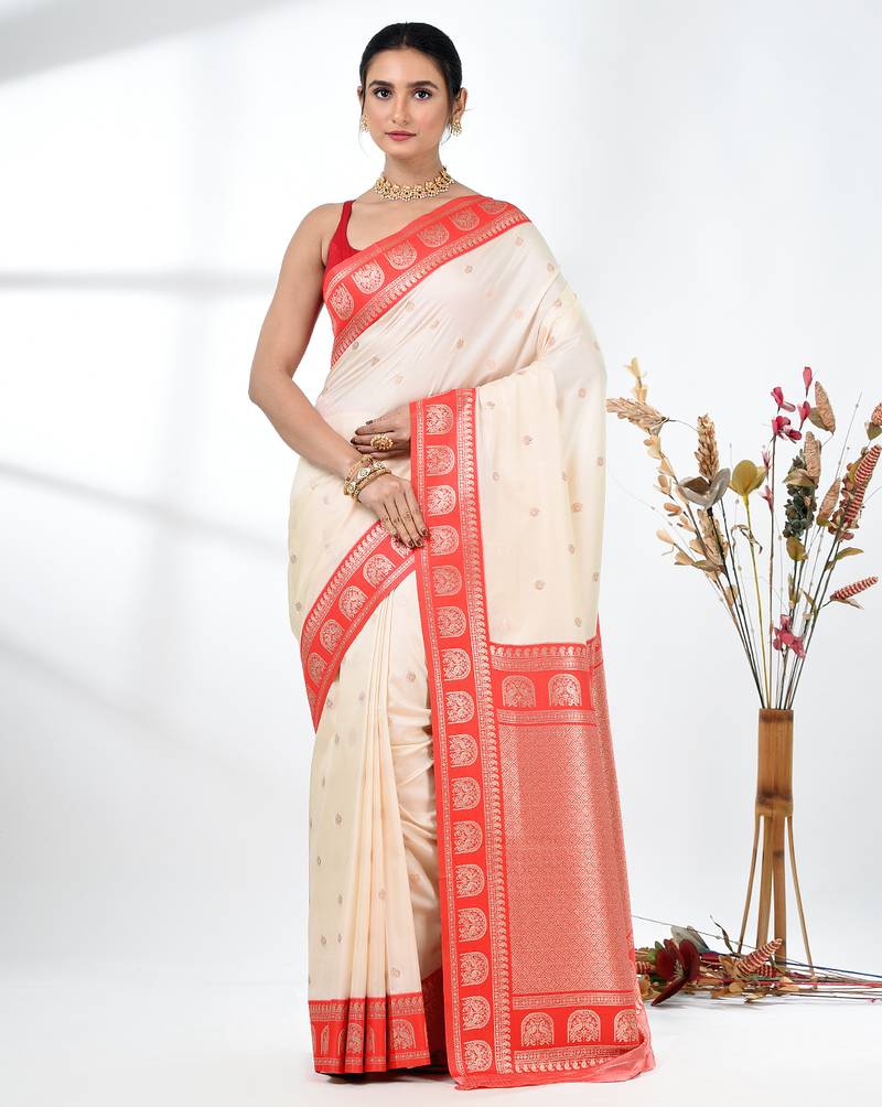 elegant off-white tussar silk blend saree with red zari border