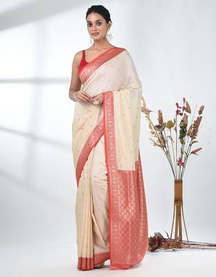 elegant off-white tussar silk blend saree with red zari border 1