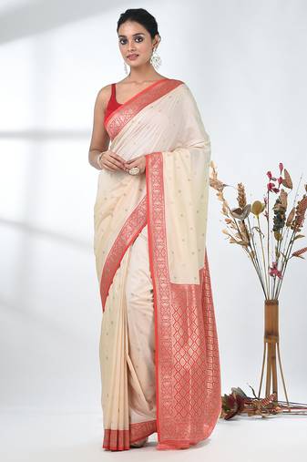 elegant off-white tussar silk blend saree with red zari border