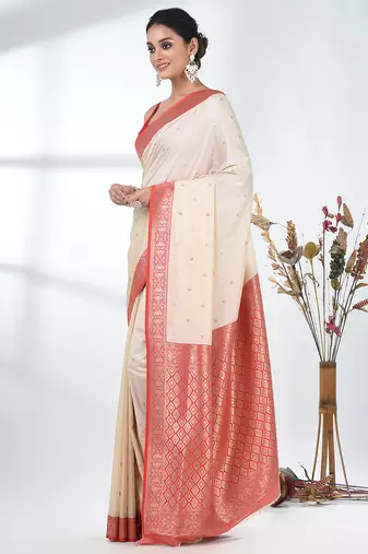 elegant off-white tussar silk blend saree with red zari border