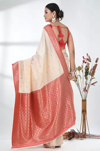 elegant off-white tussar silk blend saree with red zari border